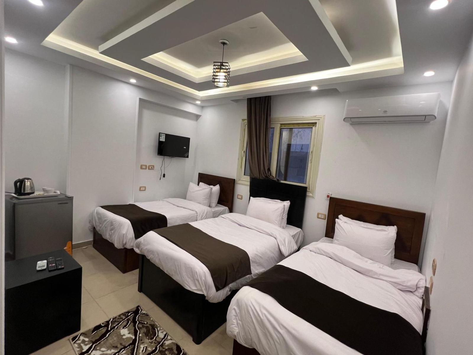 Rixsos Pyramids Inn Nazlet el-Sîsi Extérieur photo